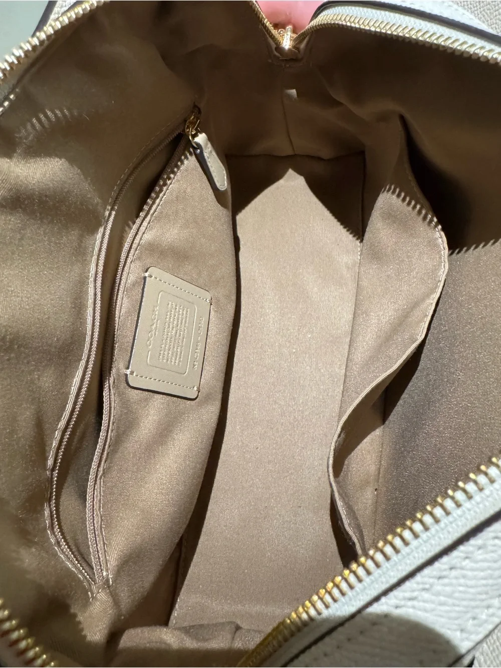 Coach Darcie carryall, with gold accents
